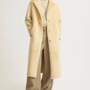 Long reversible belted shearling coat