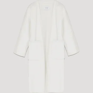 Long knit cardigan with mink fur over-pockets