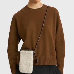 Phone case in curly merino and leather