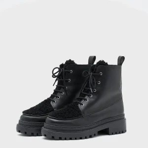 Ankle boots in leather and Lacon shearling