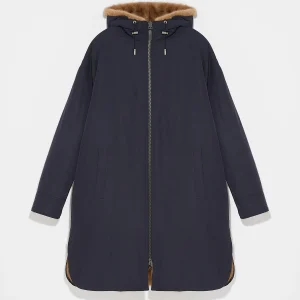 Long reversible coat in technical fabric and mink fur