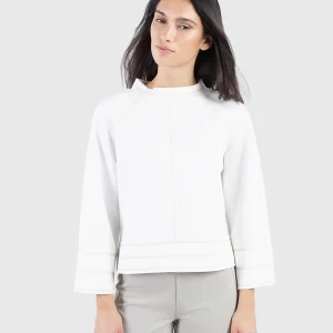 Haut raglan à surpiqûres contrastées